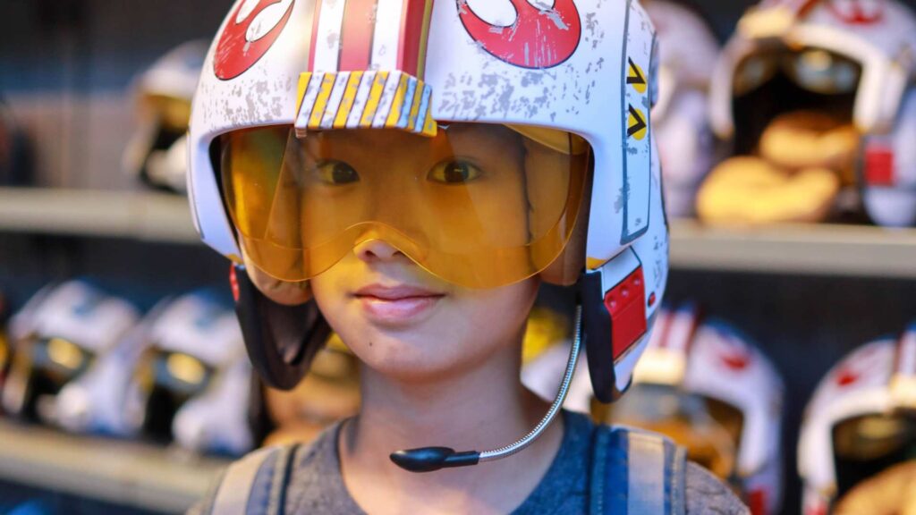 Kid with a star wars helmet